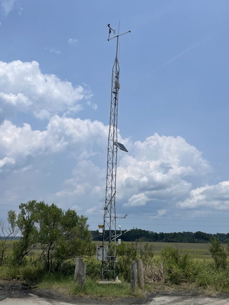 Picture of a weather tower with equipment on it